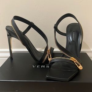 Versace Golden Zipper Stiletto Sandals.